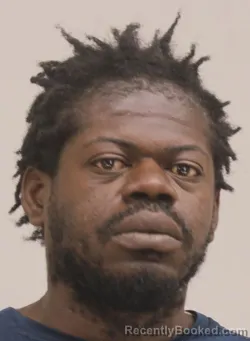 Mugshot of TRYMONED ARMWOOD booked in Dallas County, Texas on April 12, 2026