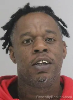 Mugshot of ADDRICK EVANS booked in Dallas County, Texas on April 13, 2026