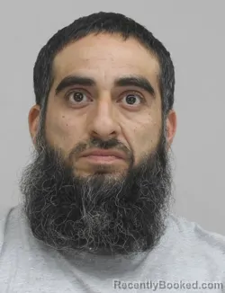 Mugshot of DANIEL ADAMES booked in Dallas County, Texas on April 13, 2026