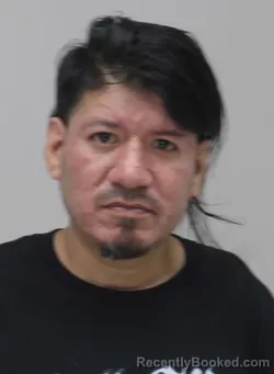 Mugshot of RICHARD AREVALO booked in Dallas County, Texas on April 13, 2026