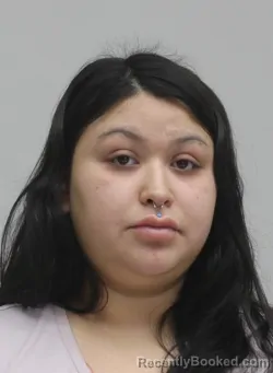 Mugshot of SCARLET SOSA booked in Dallas County, Texas on April 14, 2026