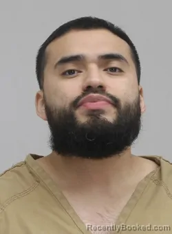 Mugshot of OMAR MARTINEZ booked in Dallas County, Texas on April 14, 2026