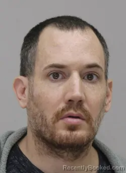 Mugshot of TYLER BECKNER booked in Dallas County, Texas on April 14, 2026