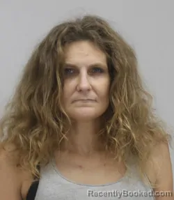 Mugshot of PENNY BROWN booked in Dallas County, Texas on April 15, 2026