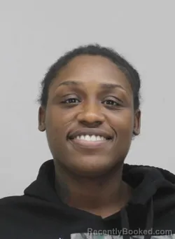 Mugshot of ASHLEY BURTON booked in Dallas County, Texas on April 15, 2026