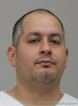 Mugshot of ROBERT GARCIA booked in Dallas County, Texas on April 15, 2026