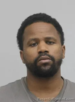 Mugshot of AMON RASHIDI booked in Dallas County, Texas on April 16, 2026