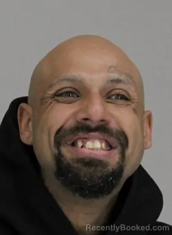 Mugshot of ANGELO JOHN booked in Dallas County, Texas on April 16, 2026