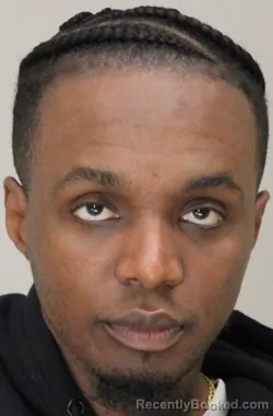 Mugshot of MWAKU KABOKOLA booked in Dallas County, Texas on April 16, 2026