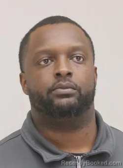 Mugshot of PAUL MBUNGO booked in Dallas County, Texas on April 18, 2026