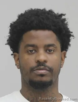 Mugshot of TAVARES LAMPKIN booked in Dallas County, Texas on April 19, 2026