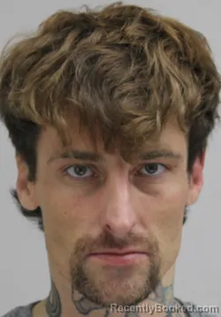 Mugshot of DALLAS SCHWEITZER booked in Dallas County, Texas on April 19, 2026