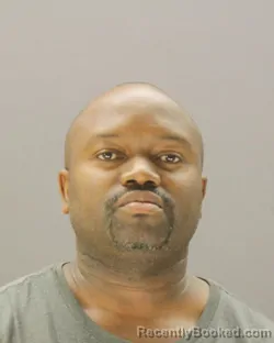 Mugshot of JOSEPHAT MWASANDUBE booked in Dallas County, Texas on April 20, 2026