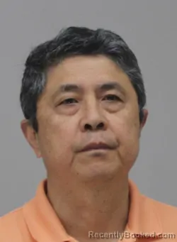 Mugshot of TAO XU booked in Dallas County, Texas on May 8, 2026