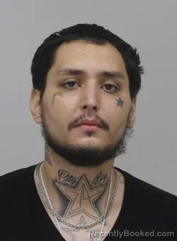 Mugshot of ABRAHAM GARZA booked in Dallas County, Texas on May 12, 2026