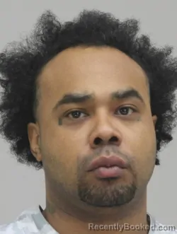 Mugshot of ESTEVAN SINGLETON booked in Dallas County, Texas on May 13, 2026