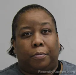 Mugshot of KRYSTAL MOFFETT booked in Dallas County, Texas on May 13, 2026