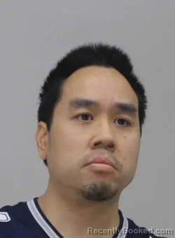 Mugshot of VIET TRAN booked in Dallas County, Texas on May 13, 2026