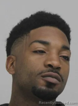 Mugshot of DEANDRE GIVENS booked in Dallas County, Texas on May 14, 2026