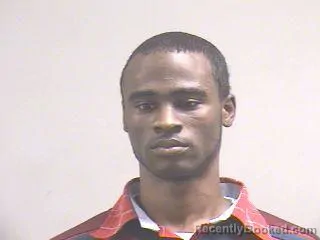 Mugshot of TRISMEGISTES NWOKO booked in Dallas County, Texas on May 18, 2026
