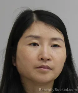 Mugshot of HUAQIN ZHU booked in Dallas County, Texas on May 29, 2026