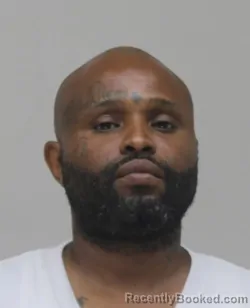 Mugshot of DOMINIQUE MINAFEE booked in Dallas County, Texas on May 30, 2026