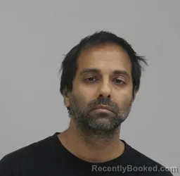 Mugshot of PRANAV BHATT booked in Dallas County, Texas on May 31, 2026
