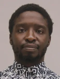Mugshot of RAPHAEL MWILIMAMURRAY booked in Dallas County, Texas on June 4, 2026