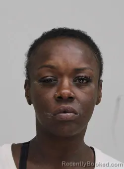 Mugshot of CURSHA TOWNSEND booked in Dallas County, Texas on June 27, 2026