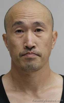 Mugshot of HERMAN HUYNH booked in Dallas County, Texas on July 14, 2026