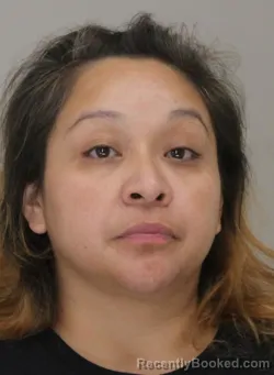 Mugshot of VICTORIA DOMINGUEZ booked in Dallas County, Texas on July 18, 2026