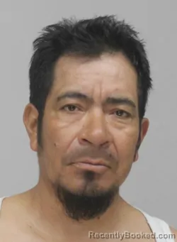 Mugshot of ELMER RAYMUNDO booked in Dallas County, Texas on July 21, 2026