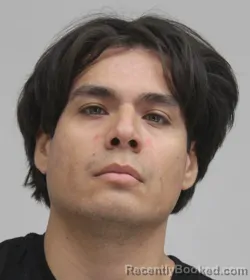 Mugshot of Rey Machado booked in Dallas County, Texas on August 22, 2026