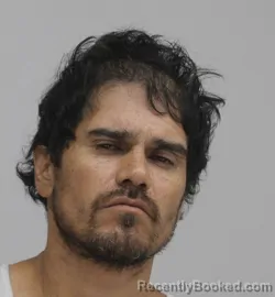 Mugshot of Adam Alonzo booked in Dallas County, Texas on August 22, 2026