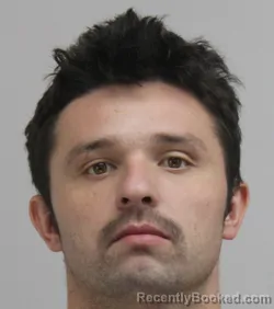 Mugshot of Austin Alonso booked in Dallas County, Texas on August 23, 2026