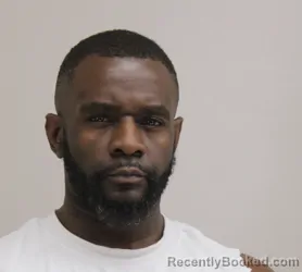 Mugshot of Dante Love booked in Dallas County, Texas on August 24, 2026
