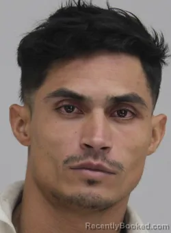 Mugshot of Uber Aveles Aguilar booked in Dallas County, Texas on August 24, 2026