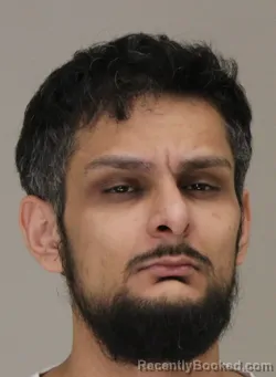 Mugshot of Raza Mirza booked in Dallas County, Texas on August 25, 2026