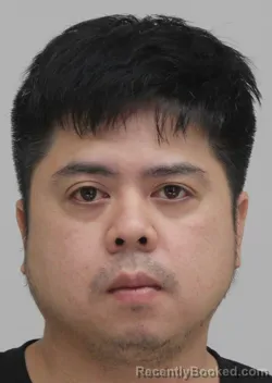 Mugshot of Le Nguyen booked in Dallas County, Texas on August 26, 2026