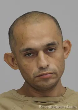 Mugshot of Carlos Mena booked in Dallas County, Texas on August 28, 2026