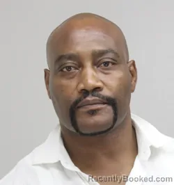 Mugshot of Okechukwu Emesiani booked in Dallas County, Texas on August 30, 2026