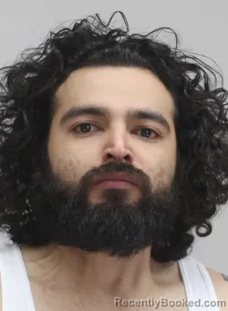 Mugshot of Isaac Flores booked in Dallas County, Texas on September 7, 2026