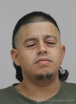 Mugshot of Jonis Alvarez booked in Dallas County, Texas on September 10, 2026