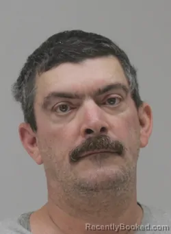 Mugshot of Claude Decker booked in Dallas County, Texas on September 13, 2026