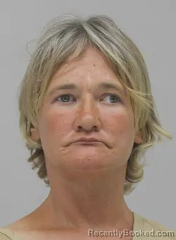 Mugshot of Lisa Neumayer booked in Dallas County, Texas on September 14, 2026