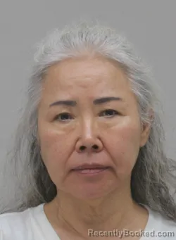 Mugshot of Micha Mun booked in Dallas County, Texas on September 14, 2026