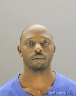 Mugshot of Quency Woods booked in Dallas County, Texas on October 11, 2026