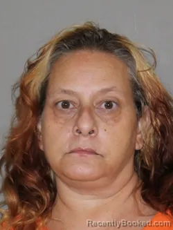Mugshot of Catherine A Dealejandro booked in Denton County, Texas on September 30, 2026