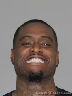 Mugshot of John-Joel J Alexander booked in Denton County, Texas on April 7, 2026