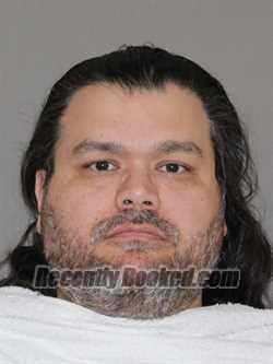 Booking photo from Denton County, Texas